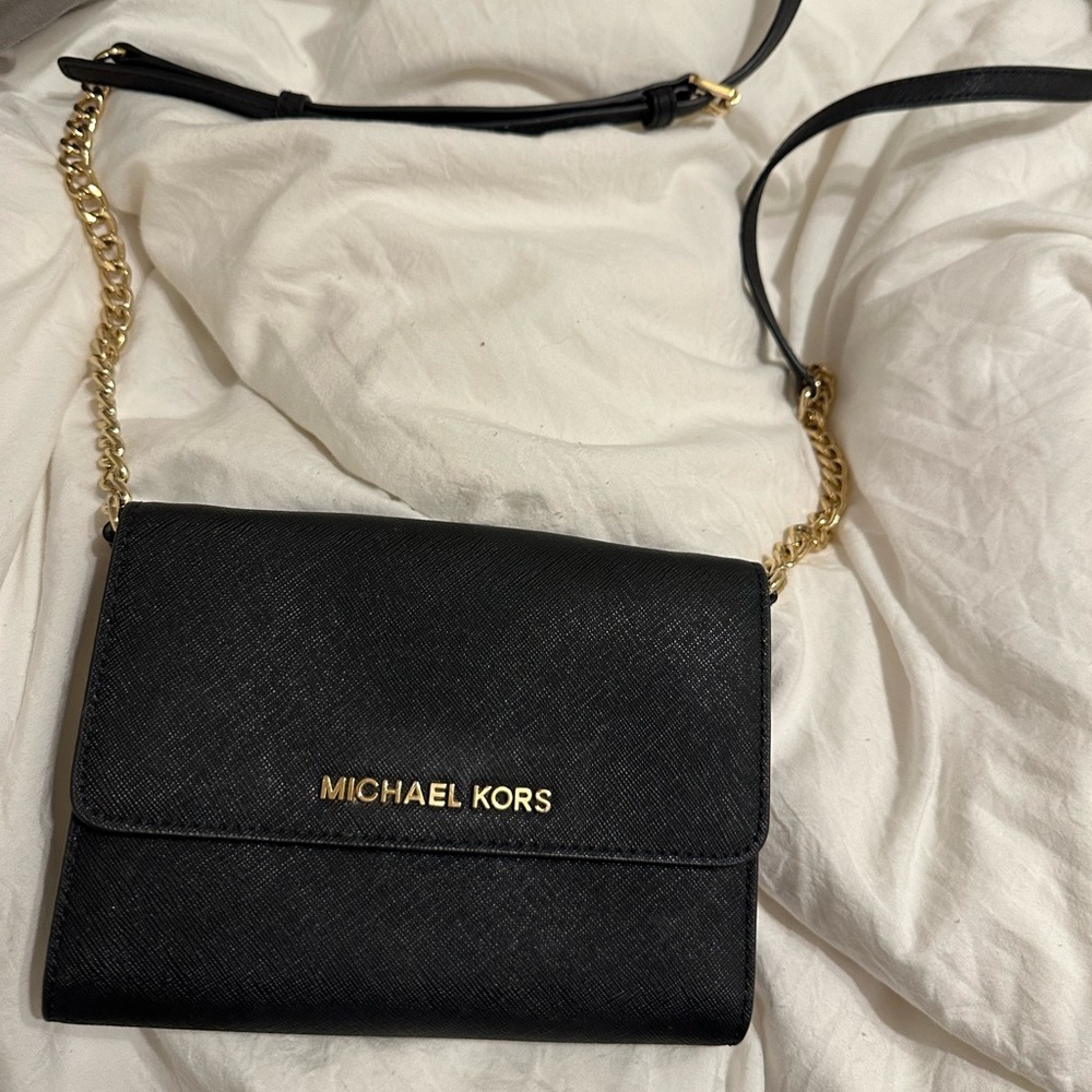 Michael Kors crossbody clutch.